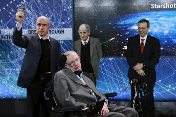 Physicist Stephen Hawking sits in front of investor Yuri Milner (L), physicist Freeman Dyson (C), and physicist Avi Loeb on stage during an announcement of the Breakthrough Starshot initiative in New York April 12, 2016. REUTERS/Lucas Jackson